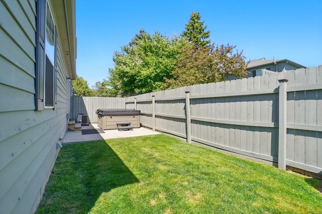 5688 Blendonridge Dr Unit 93E, Columbus, OH 43230 - view of yard with a fenced backyard, a patio, a hot tub, and central AC unit