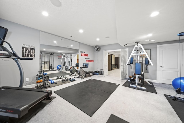 workout room with recessed lighting and baseboards