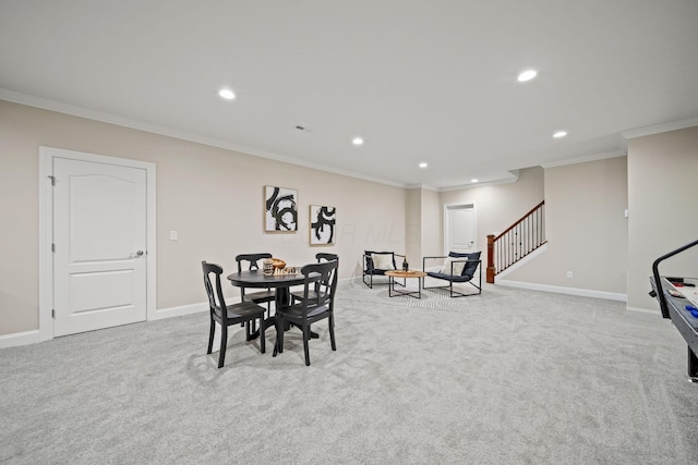 carpeted dining space with recessed lighting, ornamental molding, baseboards, and stairs