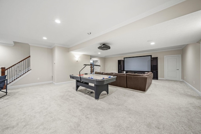 rec room featuring crown molding, recessed lighting, baseboards, and light carpet