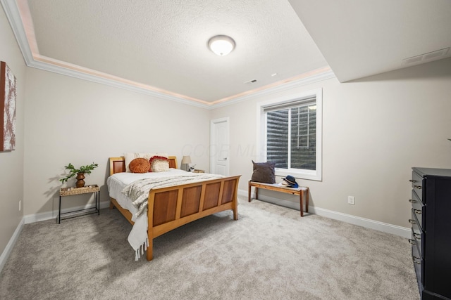 bedroom with crown molding, a textured ceiling, baseboards, and light carpet
