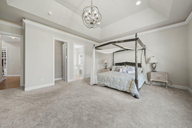 bedroom featuring a notable chandelier, a raised ceiling, carpet, baseboards, and ornamental molding