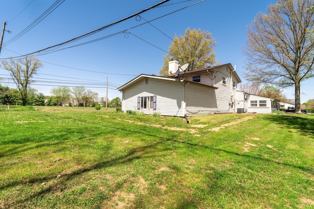 14 Stoney Ridge Dr SW, Pataskala, OH 43062 - view of side of property with a lawn and a chimney