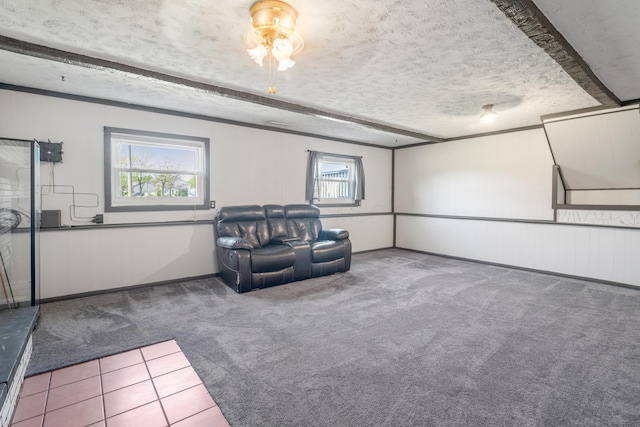 14 Stoney Ridge Dr SW, Pataskala, OH 43062 - sitting room with wooden walls, tile patterned flooring, carpet, and a textured ceiling