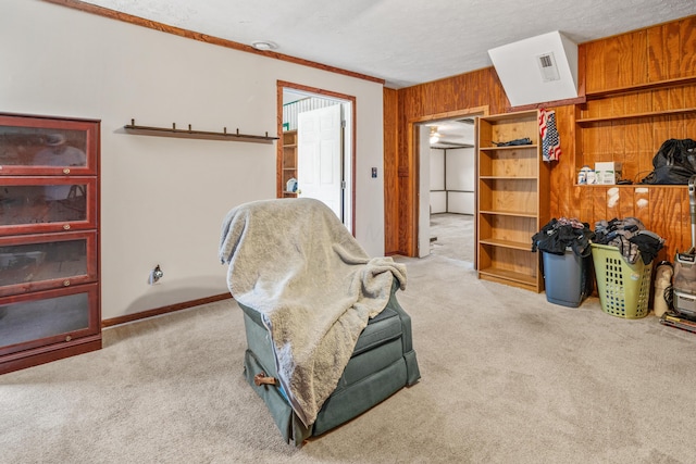 14 Stoney Ridge Dr SW, Pataskala, OH 43062 - sitting room with carpet floors, wood walls, and visible vents