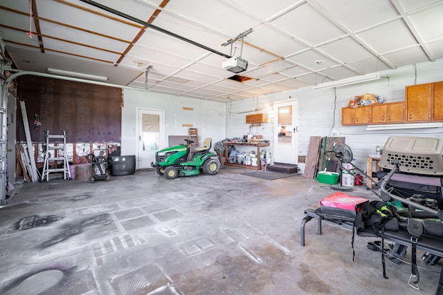 14 Stoney Ridge Dr SW, Pataskala, OH 43062 - garage featuring a garage door opener
