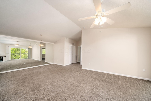 unfurnished living room featuring baseboards, carpet, and ceiling fan