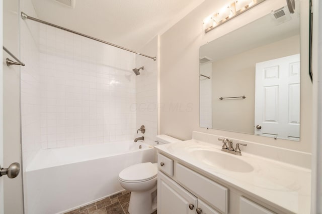 full bath with toilet, visible vents, bathing tub / shower combination, and vanity