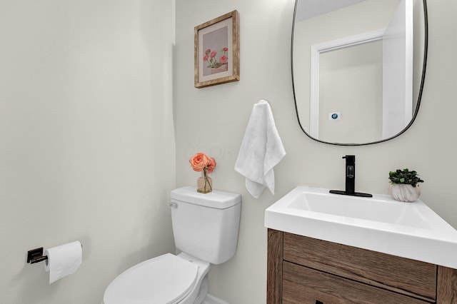 7567 Simmswood Ct, Dublin, OH 43016 - half bath with vanity, baseboards, and toilet