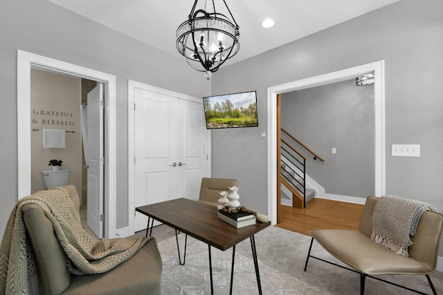 754 N 6th St, Columbus, OH 43215 - office with baseboards, wood finished floors, and a chandelier