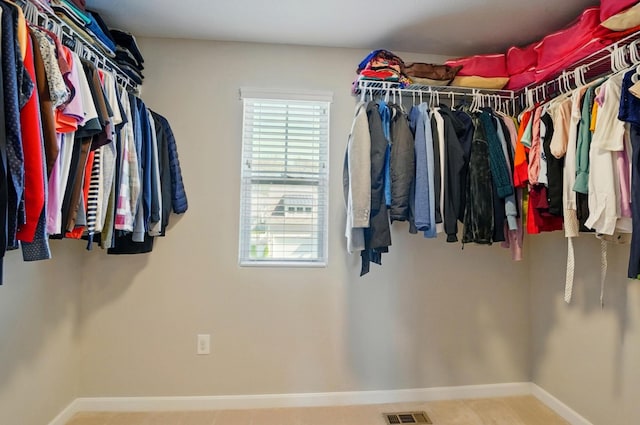 walk in closet featuring visible vents