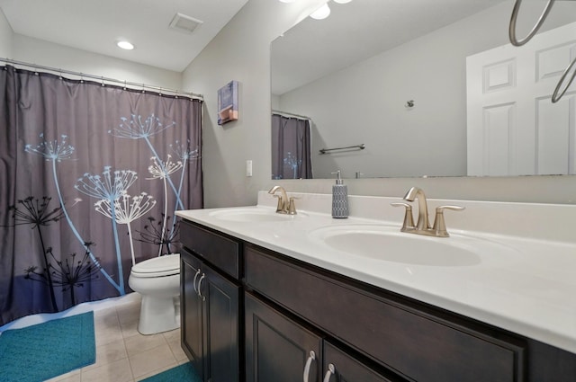 full bath with a sink, tile patterned flooring, toilet, and visible vents