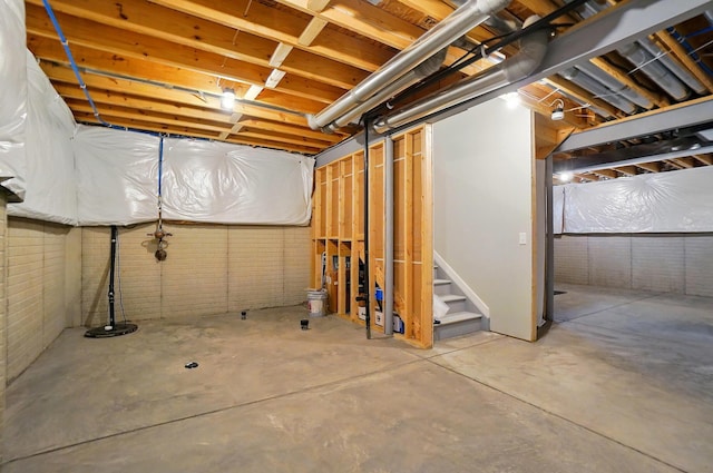 unfinished basement with stairs