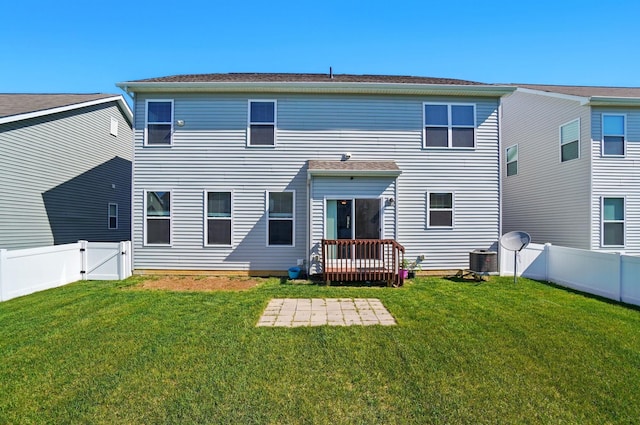 back of property featuring a gate, a patio area, central air condition unit, a fenced backyard, and a yard