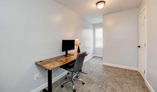 office featuring baseboards and carpet