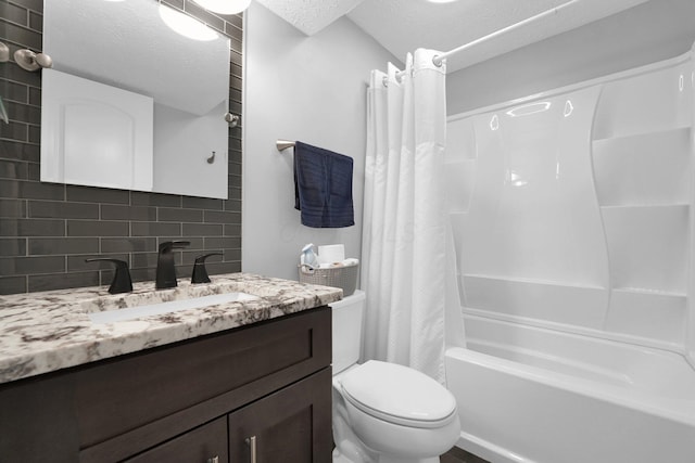 full bath with vanity, toilet, a textured ceiling, shower / tub combo, and backsplash