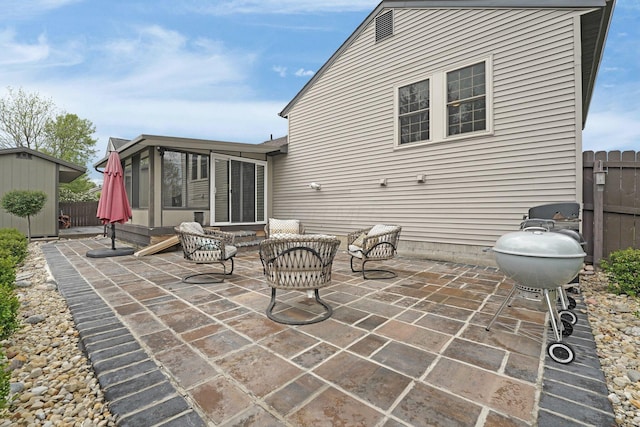 view of patio with fence