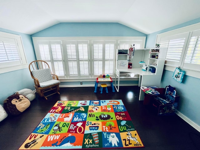 playroom with plenty of natural light and lofted ceiling
