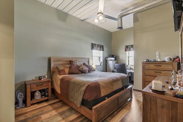 bedroom with wood finished floors and a ceiling fan