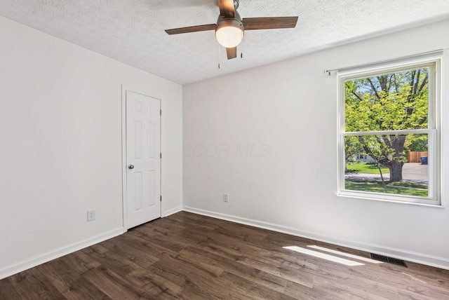 3186 Bowdoin Cir, Columbus, OH 43204 - empty room featuring wood finished floors, baseboards, a ceiling fan, and a textured ceiling