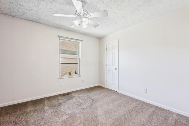 3186 Bowdoin Cir, Columbus, OH 43204 - carpeted empty room featuring a ceiling fan, a textured ceiling, and baseboards