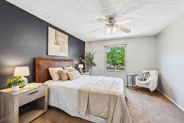 3186 Bowdoin Cir, Columbus, OH 43204 - bedroom featuring carpet flooring, a textured ceiling, a ceiling fan, and baseboards