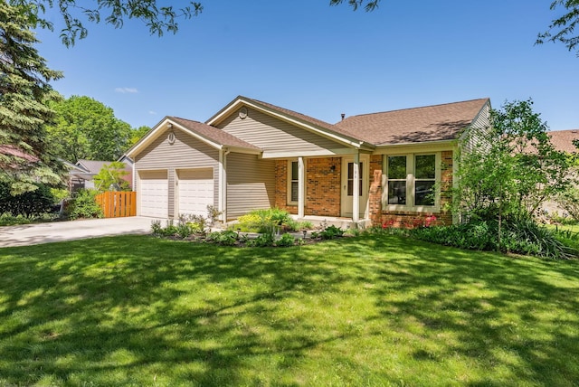 3186 Bowdoin Cir, Columbus, OH 43204 - single story home with an attached garage, driveway, brick siding, and a shingled roof