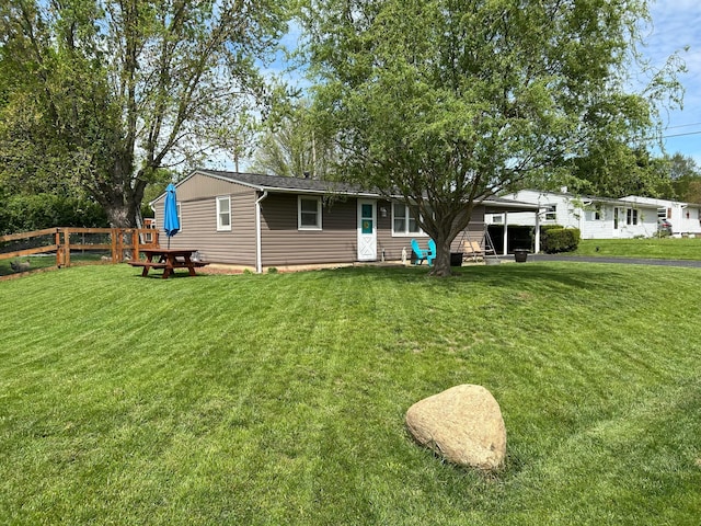 336 Lambert St, Groveport, OH 43125 - view of front of property with fence and a front yard