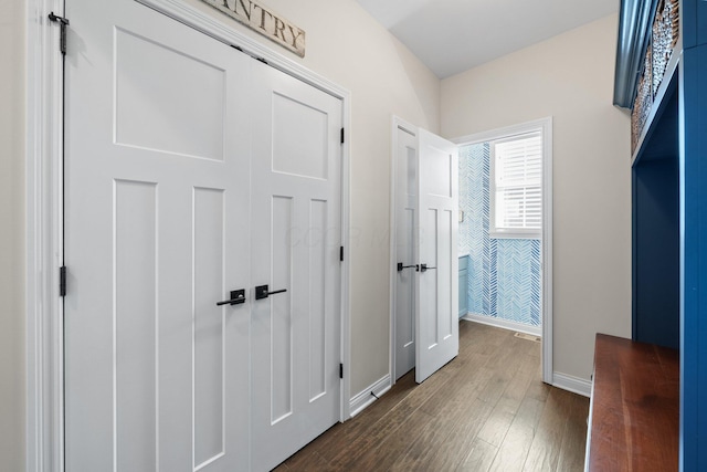 8153 Lilium Way, Plain City, OH 43064 - corridor featuring baseboards and dark wood finished floors