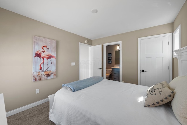 8153 Lilium Way, Plain City, OH 43064 - bedroom featuring ensuite bathroom, carpet flooring, and baseboards