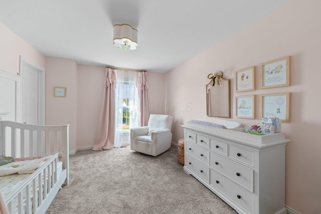 8153 Lilium Way, Plain City, OH 43064 - bedroom featuring light colored carpet, a nursery area, and baseboards