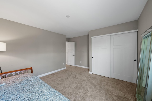 8153 Lilium Way, Plain City, OH 43064 - bedroom featuring baseboards, a closet, and carpet