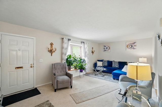 living room featuring baseboards and carpet floors
