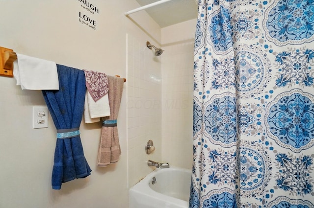 full bathroom featuring shower / bath combo with shower curtain