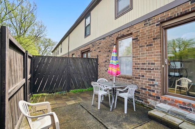 view of patio / terrace with a fenced backyard and outdoor dining area