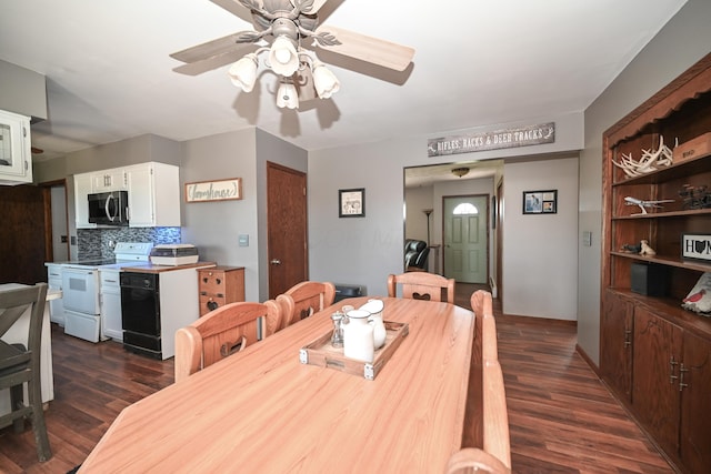 dining room with ceiling fan and dark wood finished floors