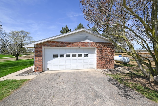 garage featuring driveway