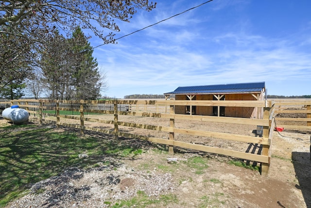 view of yard featuring an outdoor structure and an exterior structure