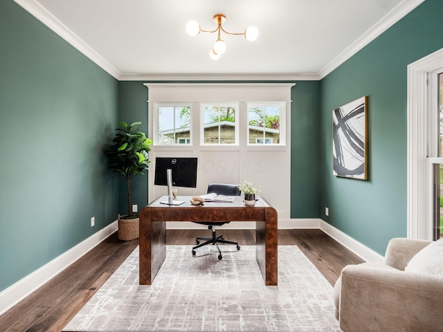 office area with ornamental molding, baseboards, and wood finished floors