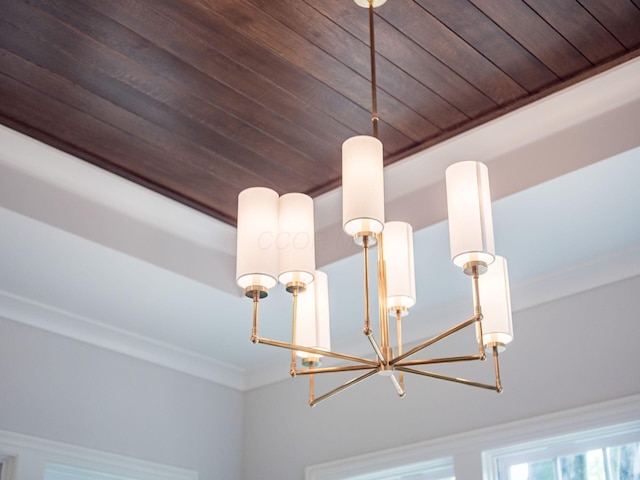 detailed view of a chandelier and wood ceiling