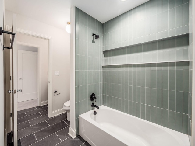 full bathroom featuring toilet, bathing tub / shower combination, and tile patterned flooring