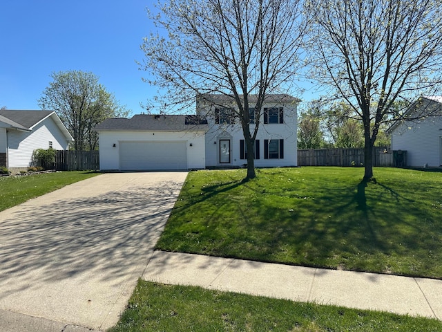view of front of house with concrete driveway, a garage, a front lawn, and fence