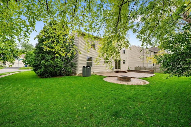 2977 Highwall Way, Columbus, OH 43221 - rear view of property featuring an outdoor fire pit, a yard, a patio area, and cooling unit