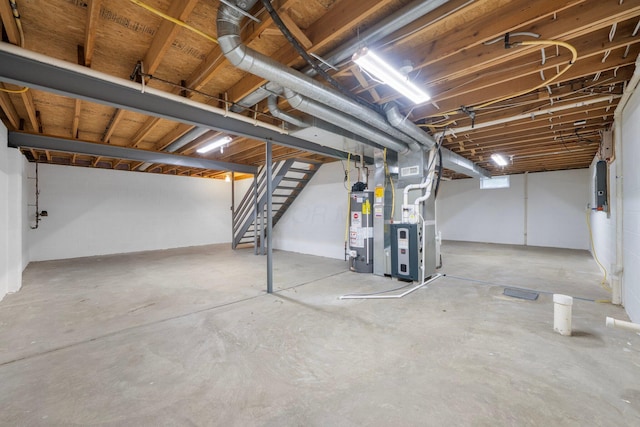 2977 Highwall Way, Columbus, OH 43221 - unfinished basement with water heater, heating unit, stairway, and electric panel