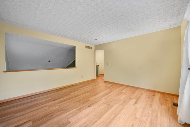 2977 Highwall Way, Columbus, OH 43221 - empty room featuring wood finished floors and baseboards