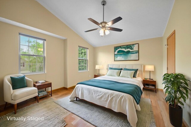 2977 Highwall Way, Columbus, OH 43221 - bedroom featuring vaulted ceiling, light wood finished floors, baseboards, and ceiling fan