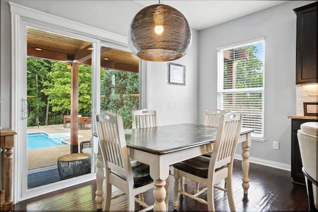 298 Long Branch Run, Delaware, OH 43015 - dining area featuring healthy amount of natural light and dark wood finished floors
