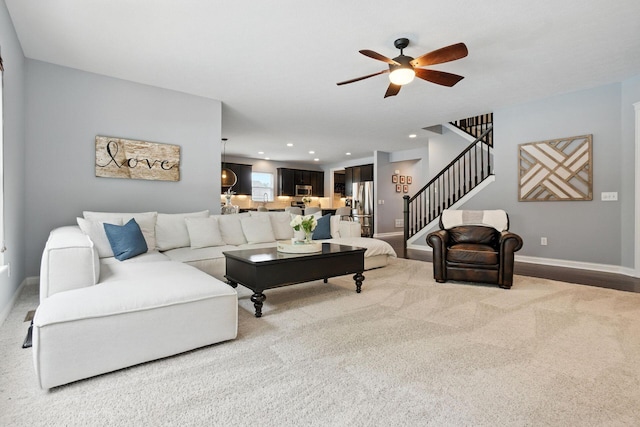 298 Long Branch Run, Delaware, OH 43015 - carpeted living area featuring a ceiling fan, stairs, and recessed lighting