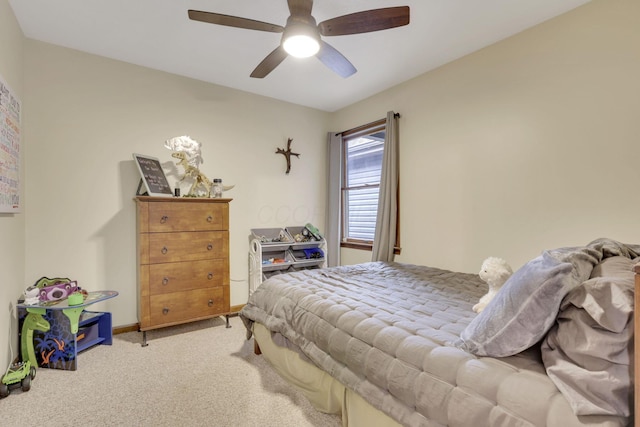 1909 Carroll Eastern Rd NW, Lancaster, OH 43130 - bedroom with baseboards, ceiling fan, and light carpet