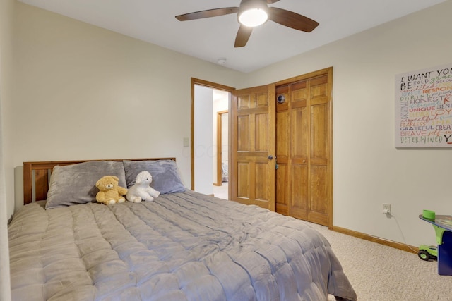1909 Carroll Eastern Rd NW, Lancaster, OH 43130 - carpeted bedroom featuring baseboards, a ceiling fan, and a closet